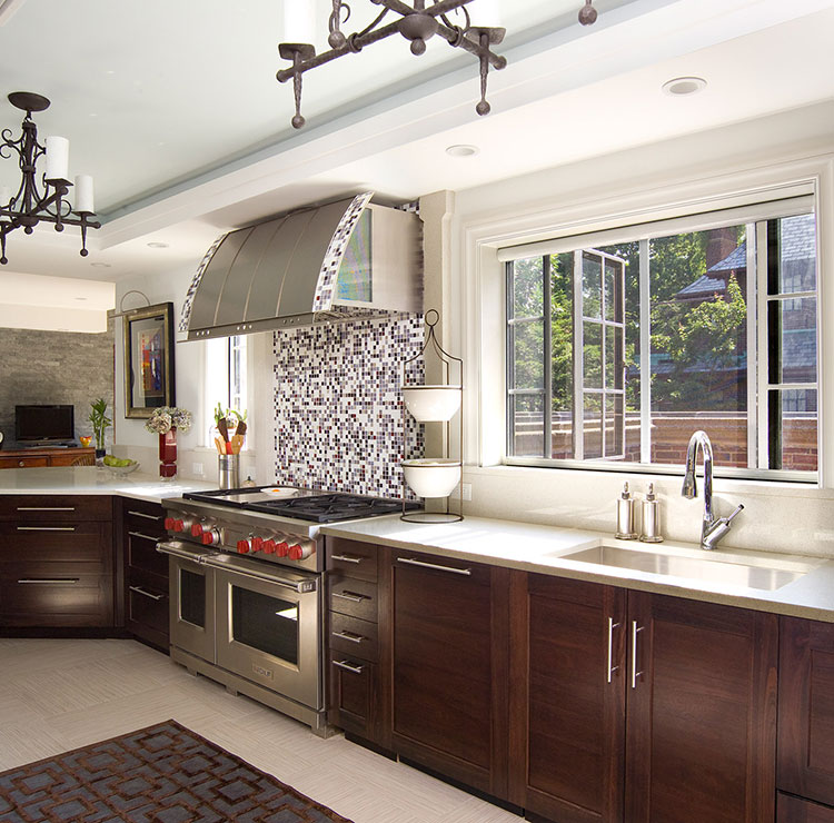 Contemporary kitchen with dark wood cabinets, mosaic backsplash, and large window above sink